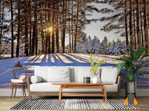 Sunset over a snowy forest wall mural in a modern living room, perfect for wallpaper installations Johannesburg.