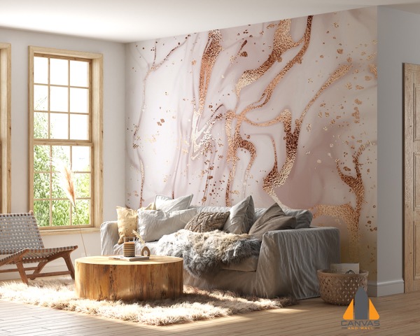 Pink and rose gold marble wall mural in a modern living room with large windows.